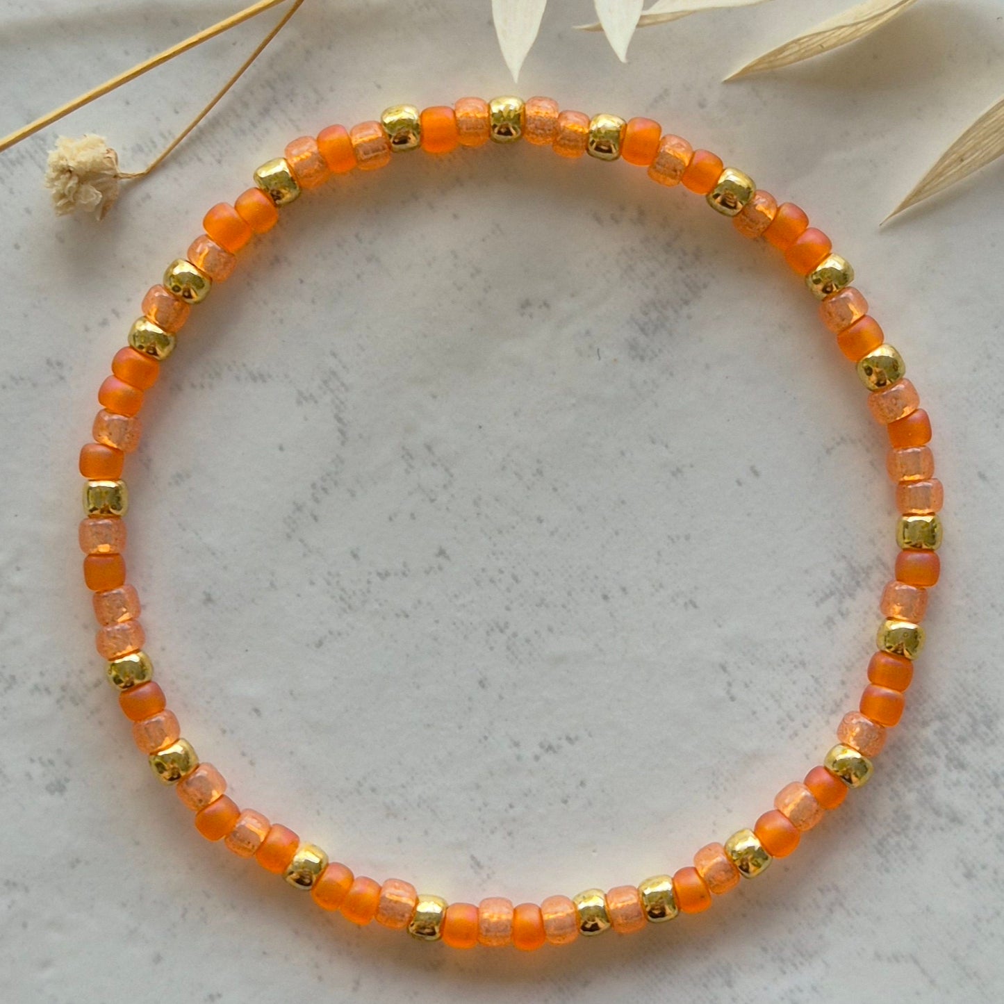 Armkette 3mm Orange & Gelbgold