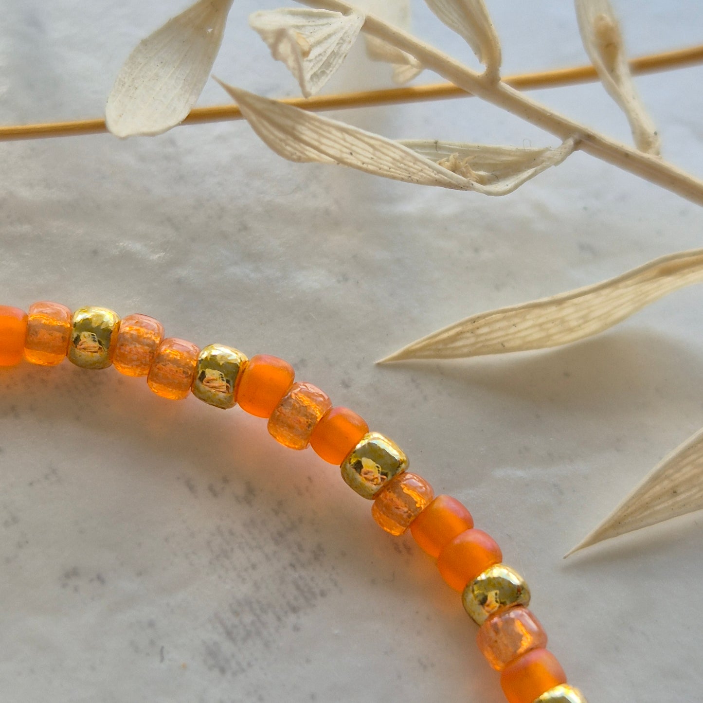Armkette 3mm Orange & Gelbgold