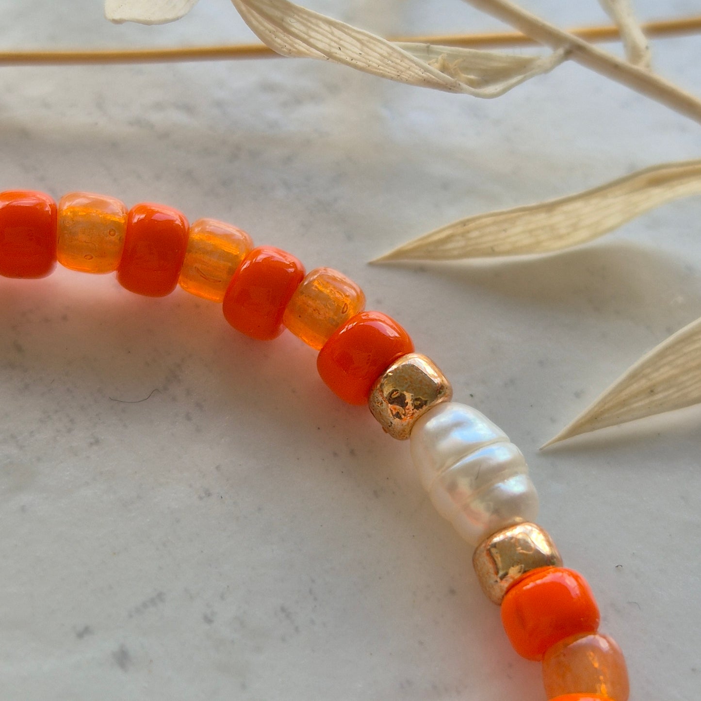 Armkette Orange 4mm mit Süßwasserperlen