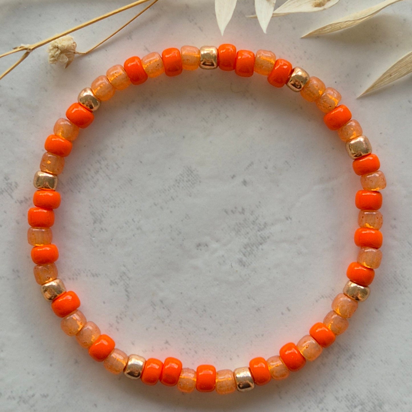 Handgemachte Armkette Orange Glasperlen